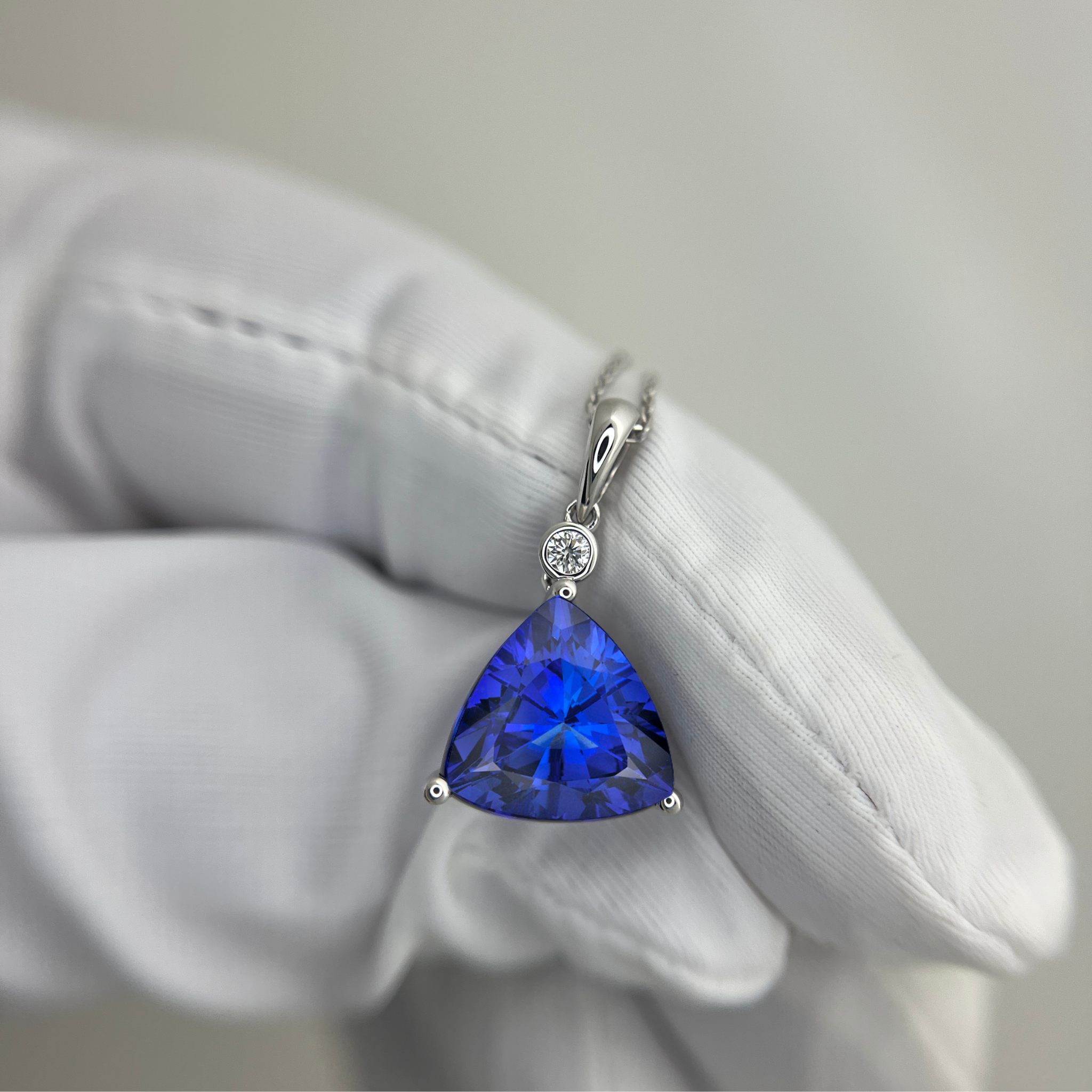 Exceptional Trillion Cut Tanzanite & Diamond Pendant White Gold