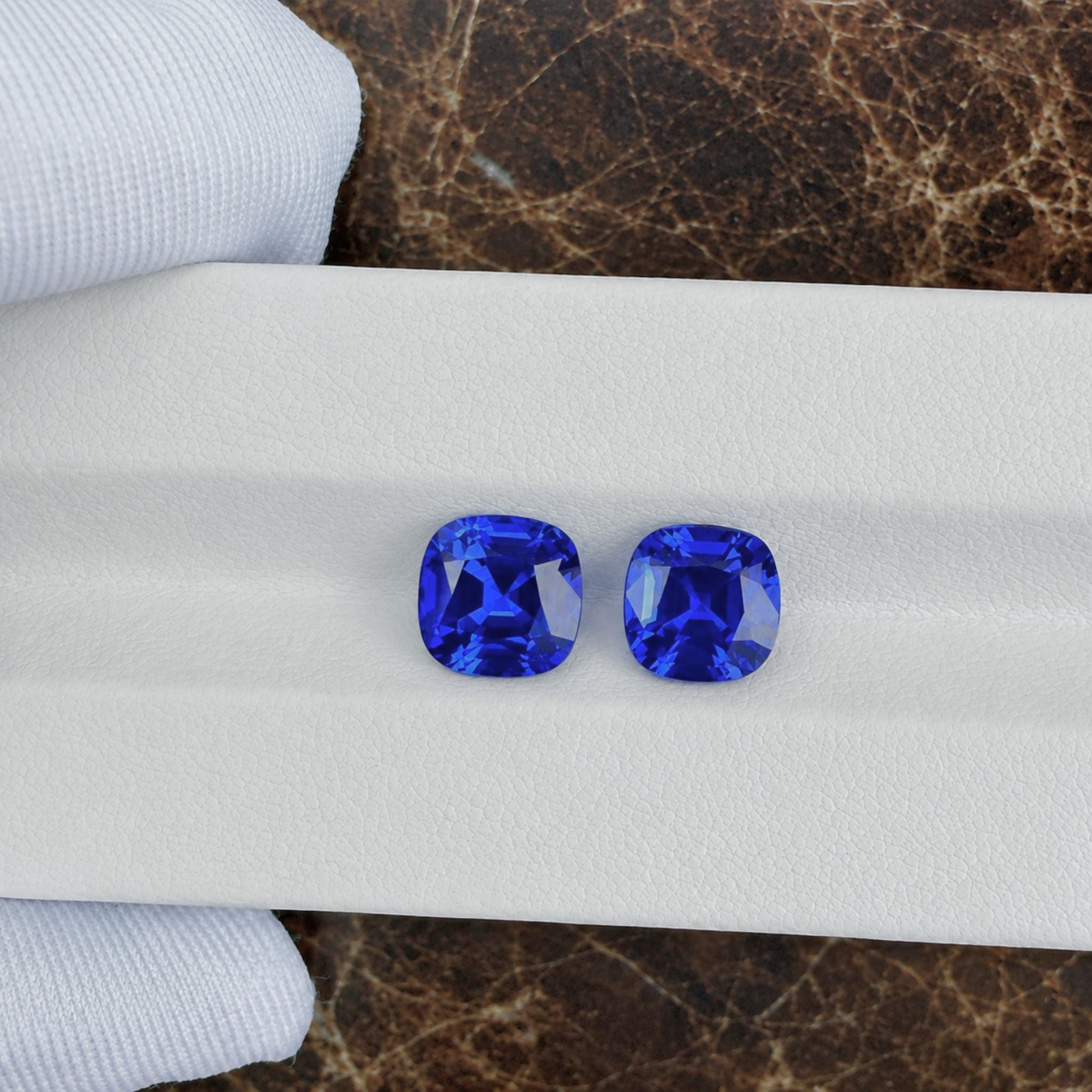 5.72 total carat cushion-cut tanzanite gemstone pair