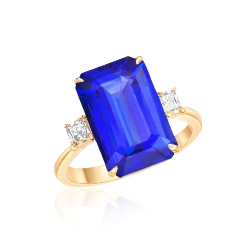 Emerald Cut Tanzanite Ring with Princess Cut Diamonds