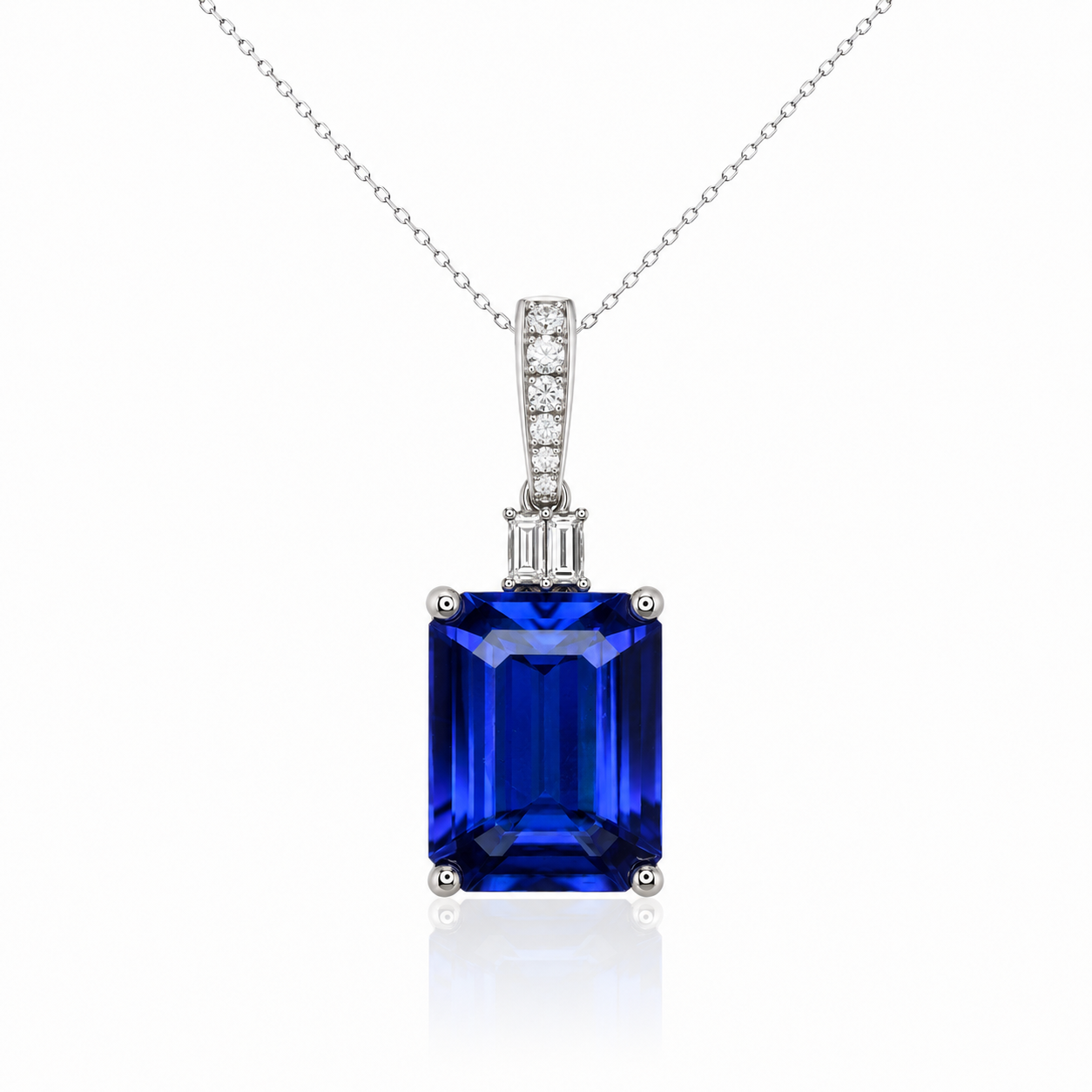 Exceptional Emerald Cut Tanzanite & Baguette Diamond Pendant White Gold