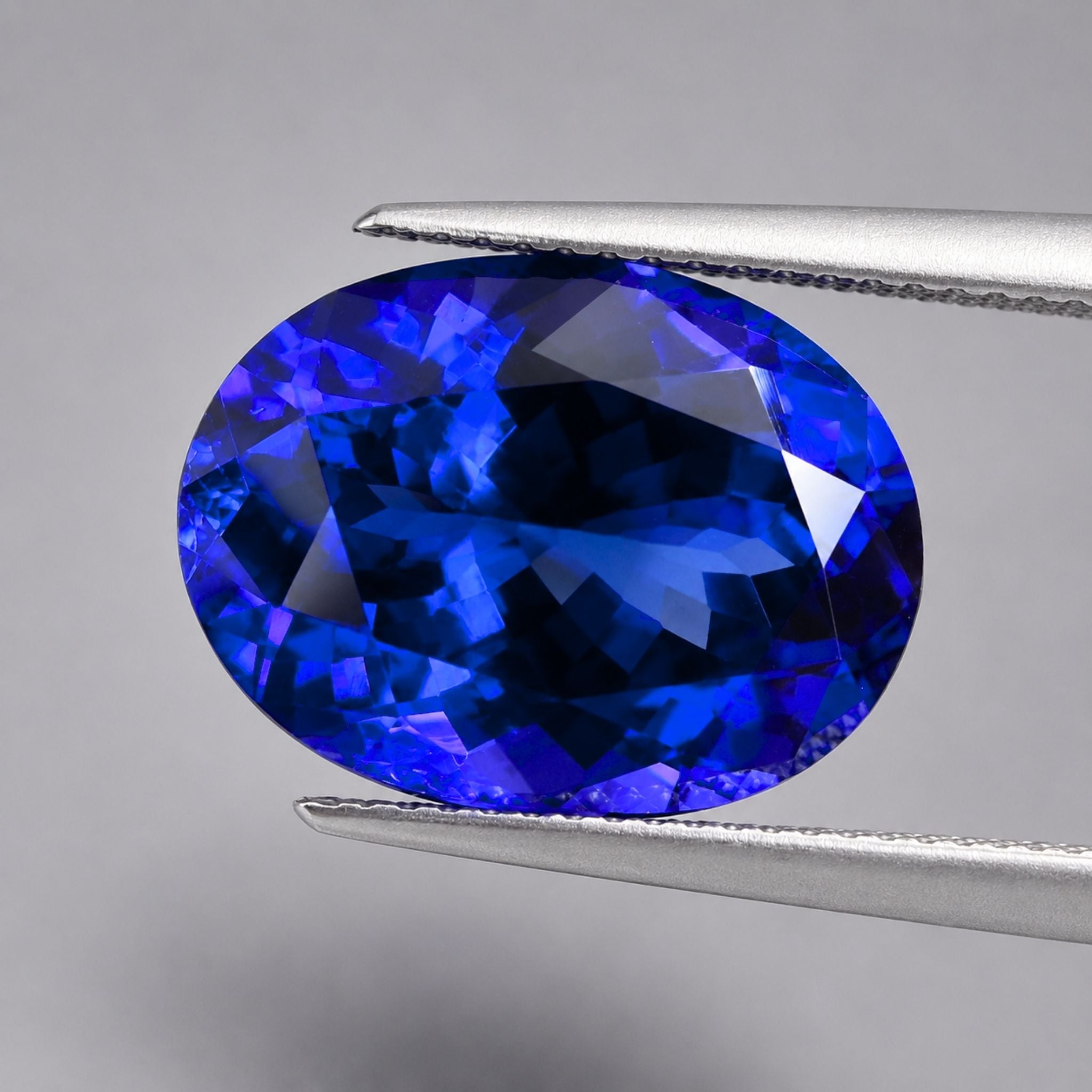 Emerald-cut tanzanite gemstone with vivid royal blue colour