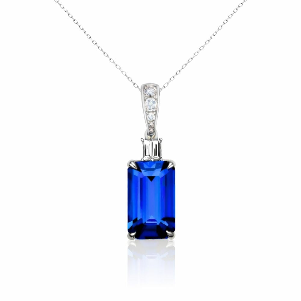 Exceptional Emerald Cut Tanzanite & Baguette Diamond Pendant White Gold