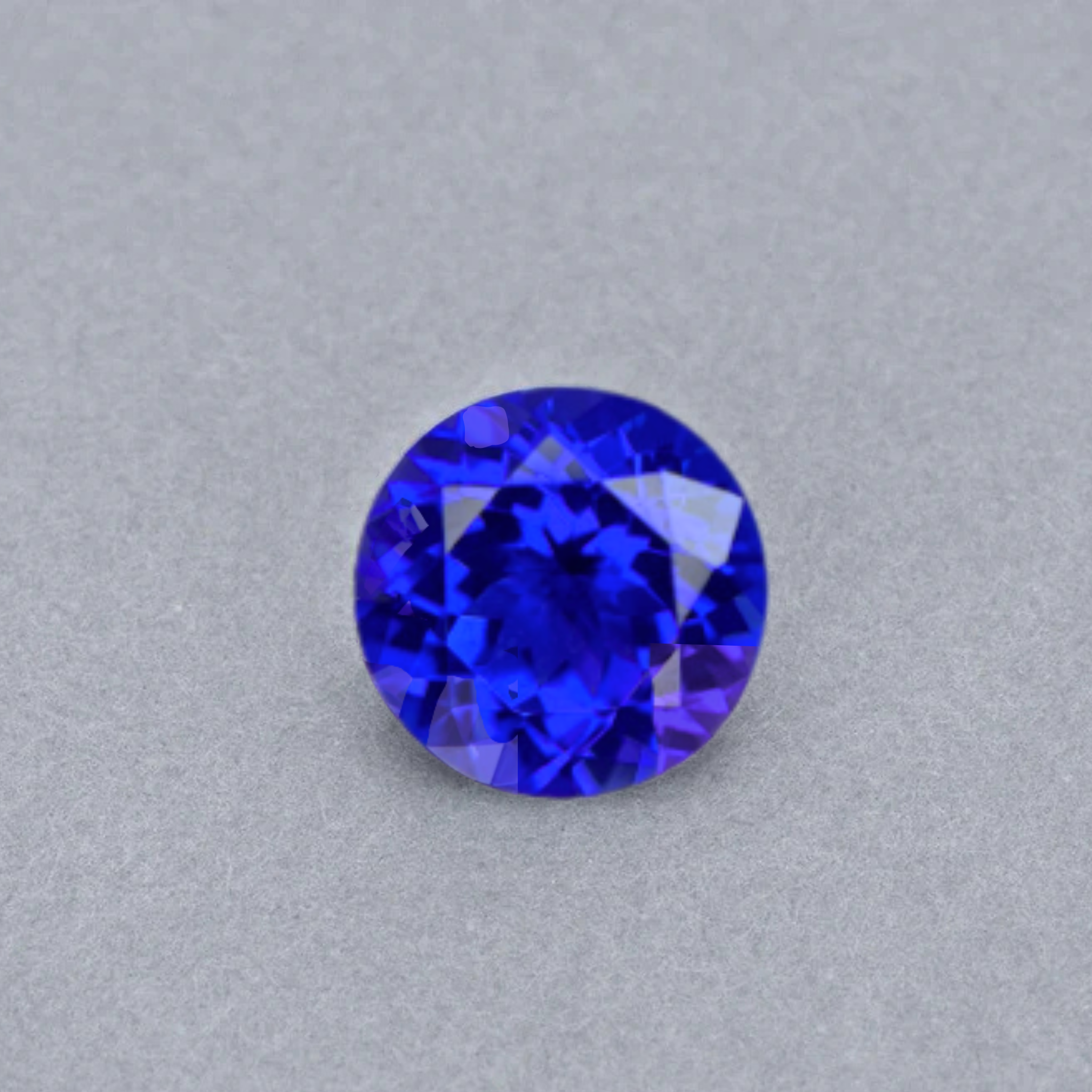 Emerald-cut tanzanite gemstone with vivid royal blue colour