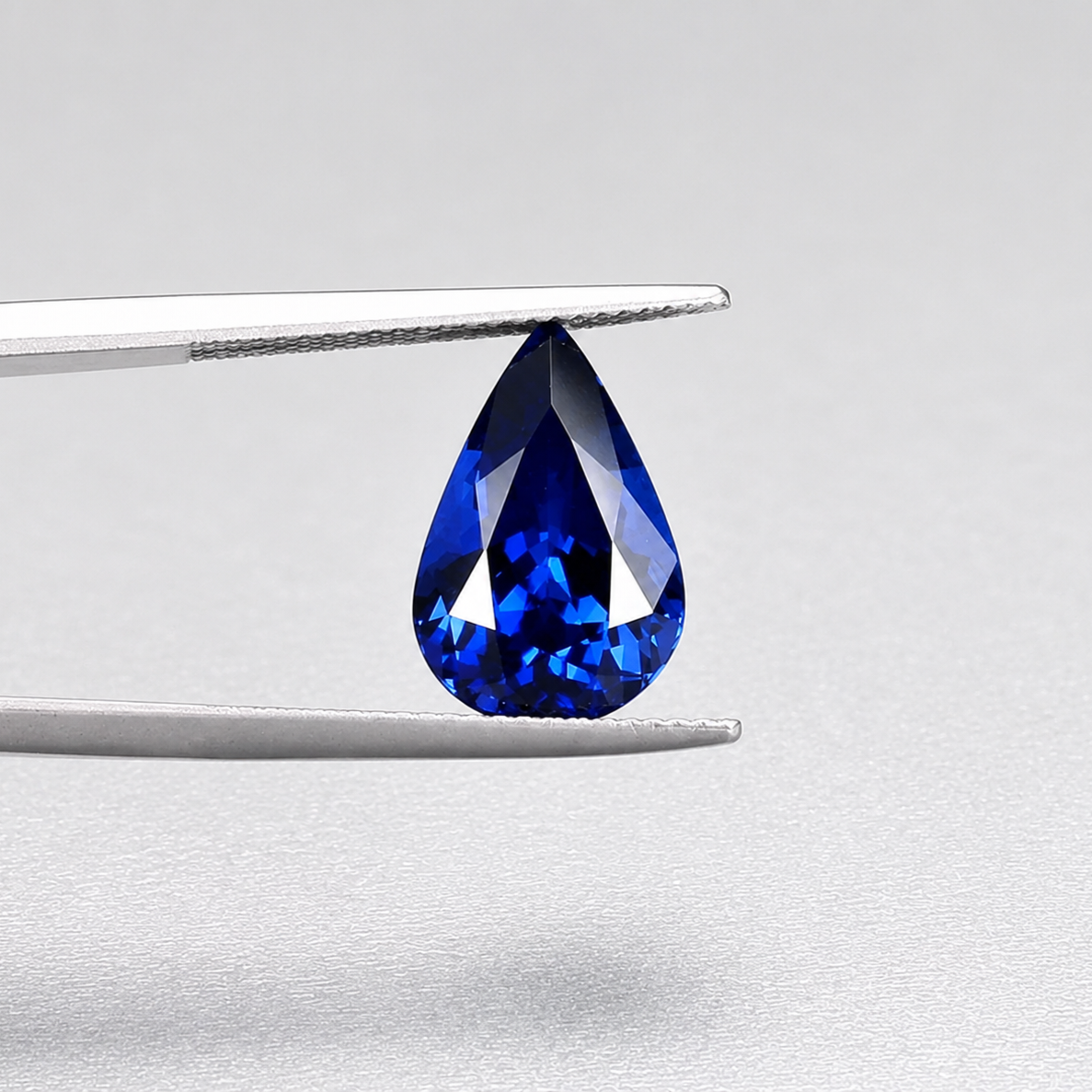 Emerald-cut tanzanite gemstone with vivid royal blue colour