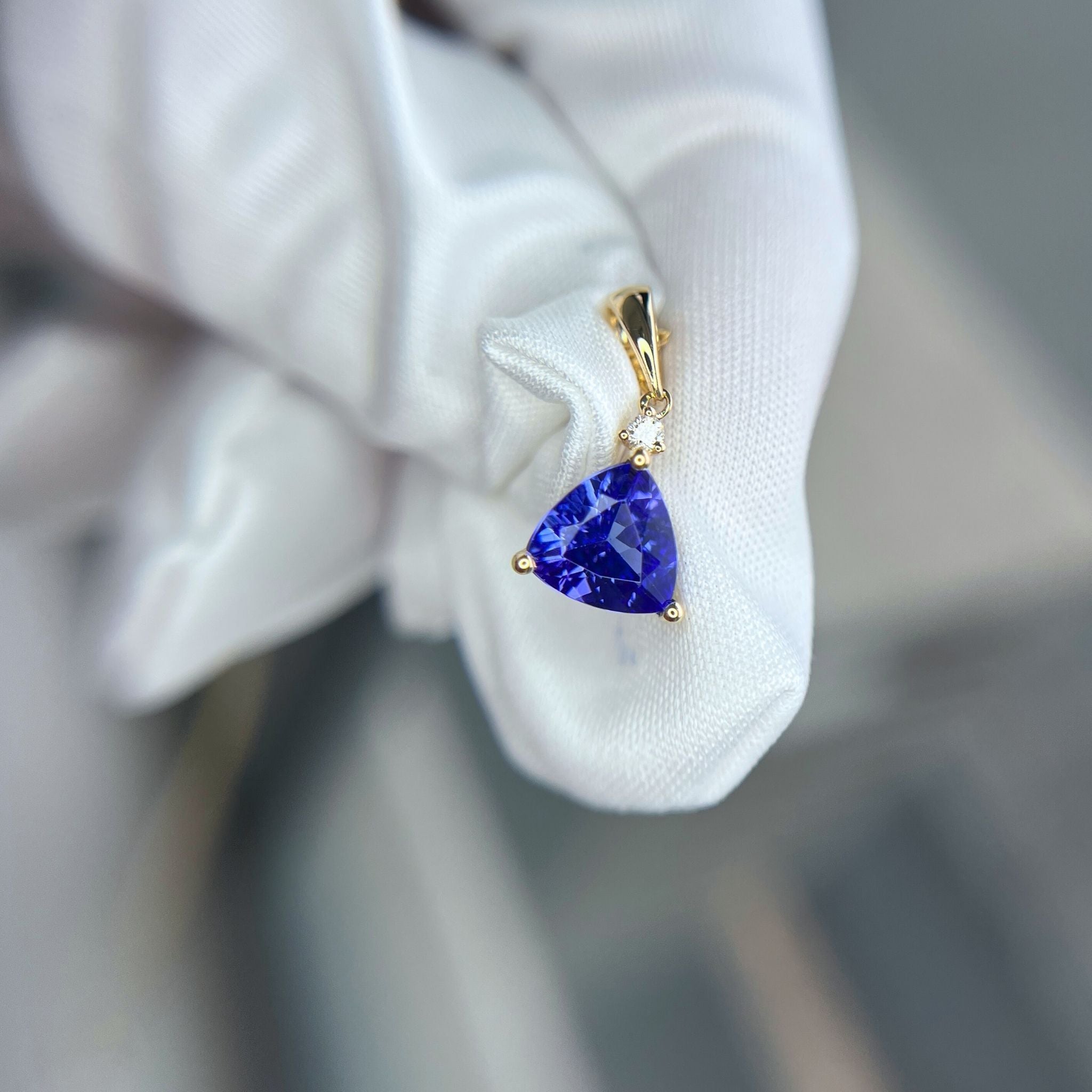Trillion Cut Tanzanite & Diamond Pendant in Yellow Gold