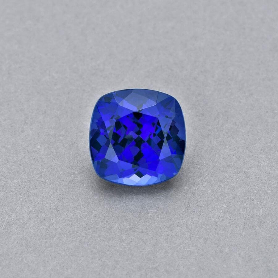 Emerald-cut tanzanite gemstone with vivid royal blue colour