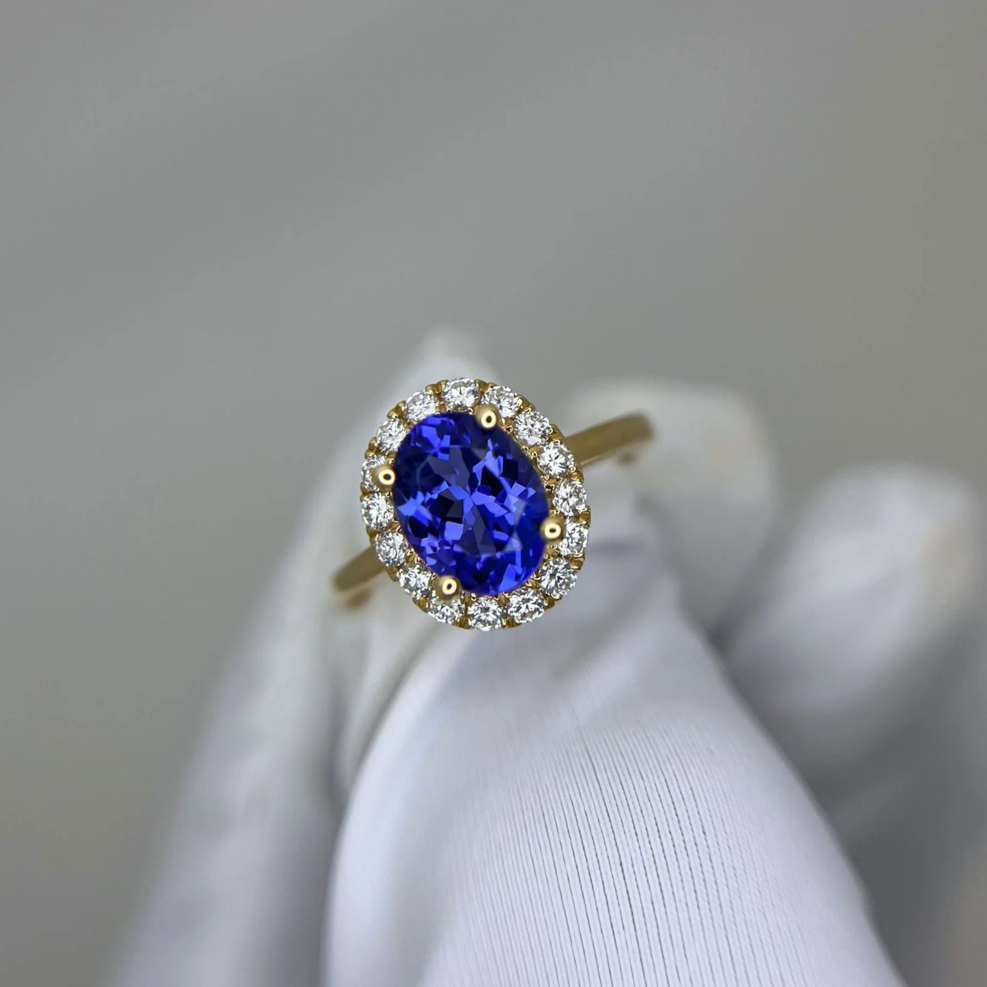 ”Kate” 2.00 Ct Oval Tanzanite & Diamond Halo Ring in Yellow Gold