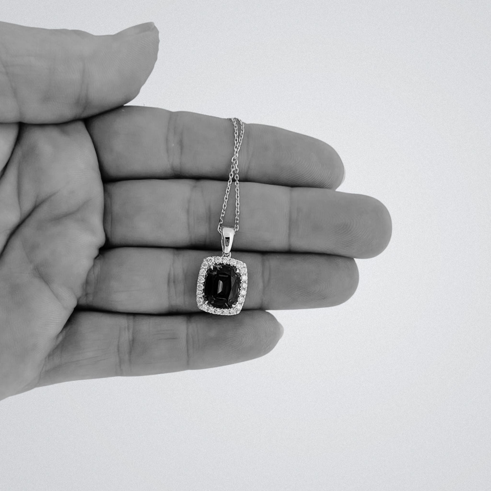 Antique Cushion Cut Tanzanite Pendant with Diamonds.