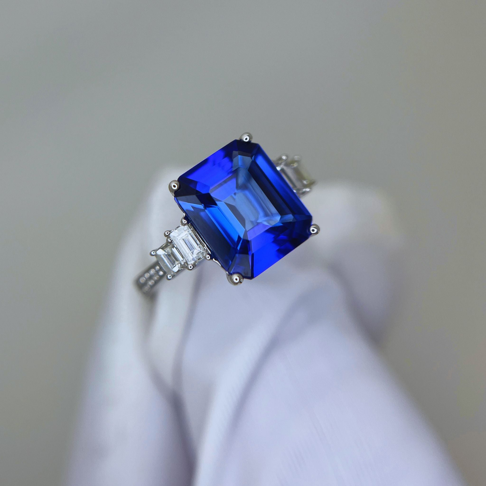 Emerald Cut Tanzanite Art Deco Ring & Baguette Diamonds.
