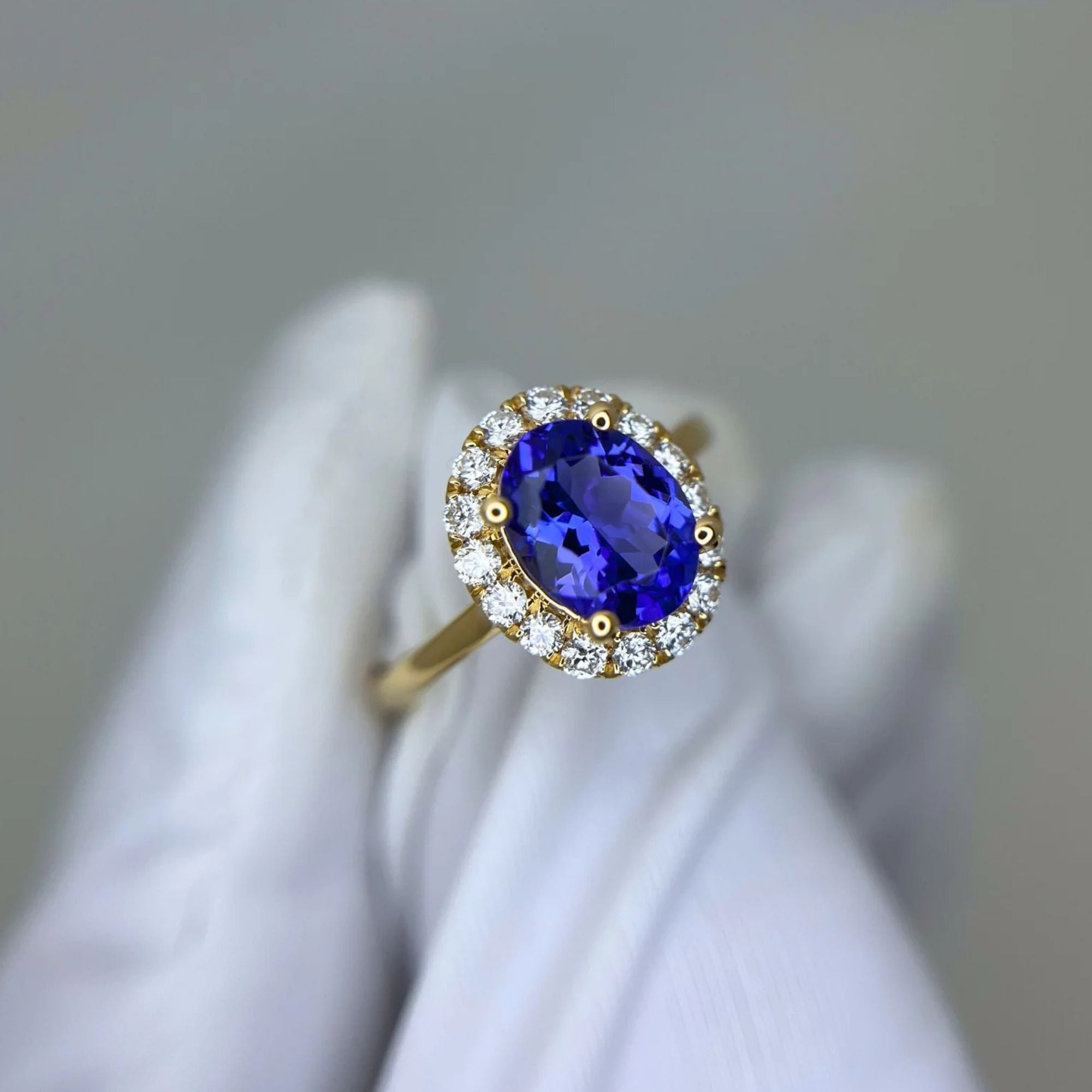 ”Kate” 2.00 Ct Oval Tanzanite & Diamond Halo Ring in Yellow Gold