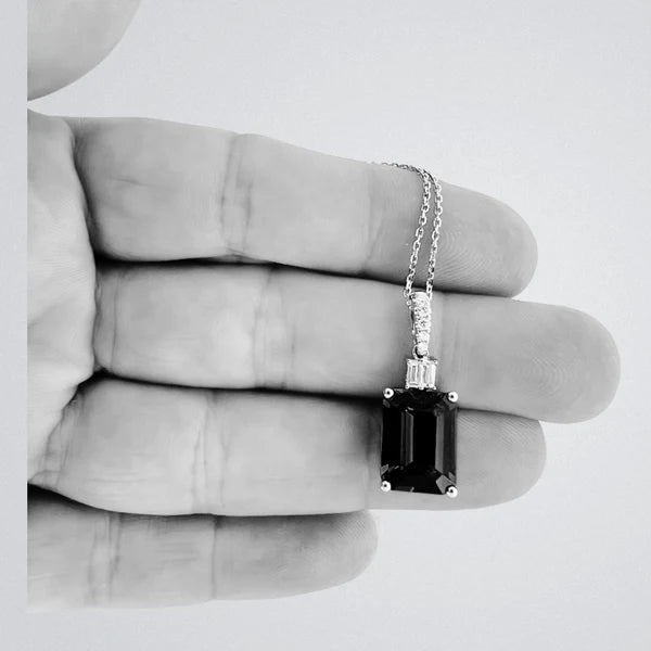 Made to Order: Exceptional Emerald Cut Tanzanite & Diamond Pendant