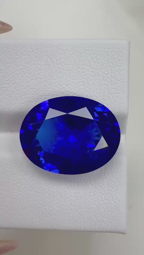13.18 ct + oval + natural tanzanite + GIA + blue dominant + AAA+