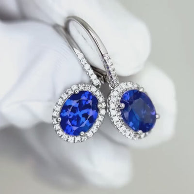 top-grade oval tanzanite earrings accented with brilliant diamonds and exceptional gemstone quality.
